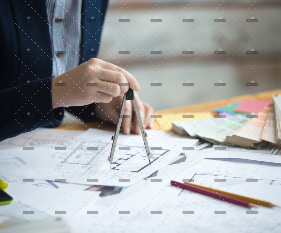 demo attachment 13 female architect using drawing compass pznmceu min